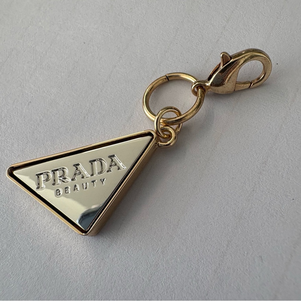 Prada Gold Triangle Logo Charm with Cream Enamel - Picture 3 of 9